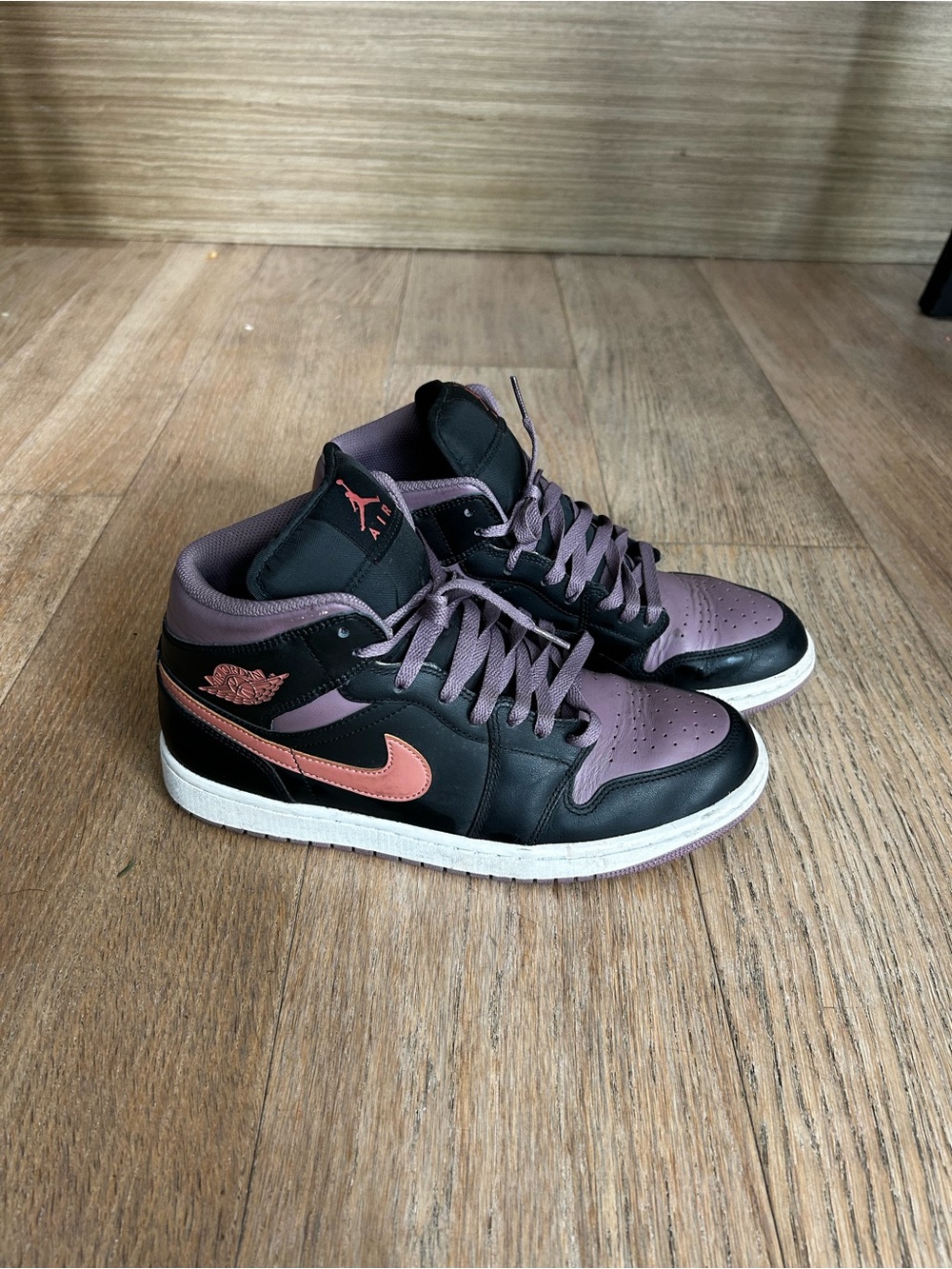 Men’s Jordan 1s Black and Mauve with Coral Swoosh